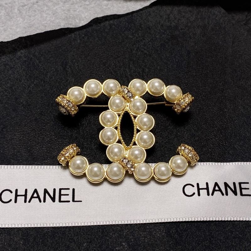 Ch*el brooches